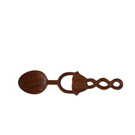 Handmade Redwood Spiral Spoon, a beautiful natural wood piece perfect for kitchen decor.