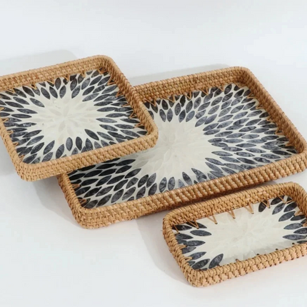 Eco-friendly rectangle rattan tray with handcrafted mother of pearl inlay.