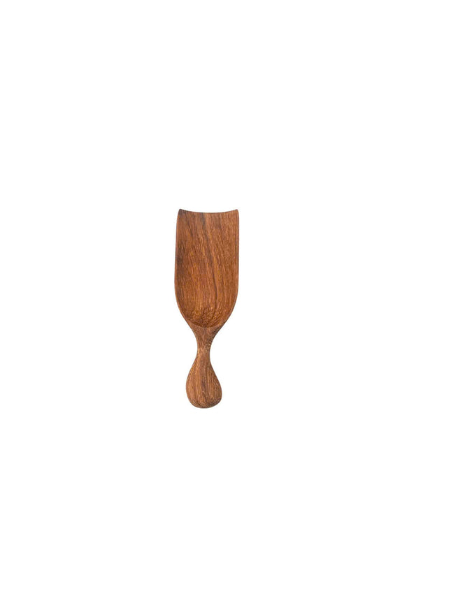 A cute handcrafted wooden multi purpose scoop for everyday use and simple living.