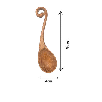 Handcrafted wooden spoon with hole available in various sizes designed for cooking serving and everyday kitchen use.