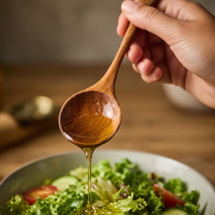 Handmade wooden spoon with long handle deep design ensures safe use and supports healthy cooking for everyday kitchen needs.