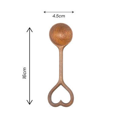 Hand carved heart spoon in a perfect size for cooking, serving, and adding warmth to your kitchen.