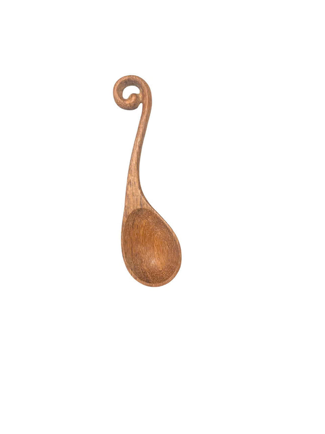 Handcrafted wooden spoon with hole designed for everyday cooking use, offering durability, comfort, and a user friendly experience.