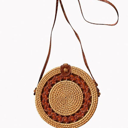 Intricate braided mandala round rattan crossbody bag size details.