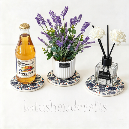 Made from ceramic with absorbent properties, this coaster helps manage drink condensation and is easy to clean.