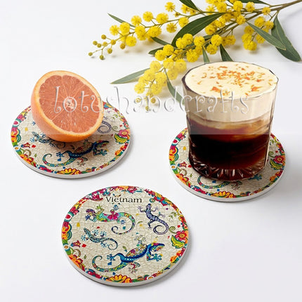 Surprise someone special with a colourful ceramic coaster featuring charming salamander illustrations and intricate floral details. 