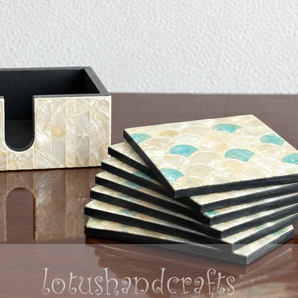 A detailed view of the coordinating holder with the six square coasters neatly arranged, highlighting the convenient storage design and decorative shell mosaic.