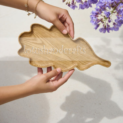 Ash wood oak leaf serving tray with a natural finish that is safe for everyday use.