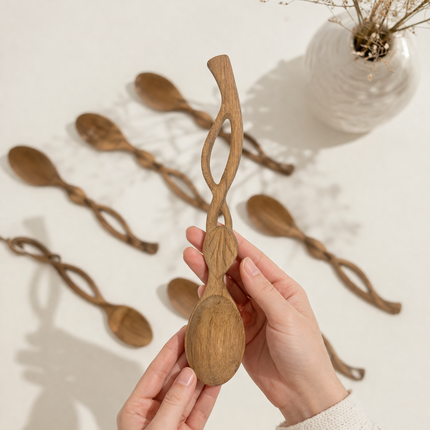 Handcrafted leaf handle wooden spoon made from natural wood brings elegance durability and comfort to daily use.