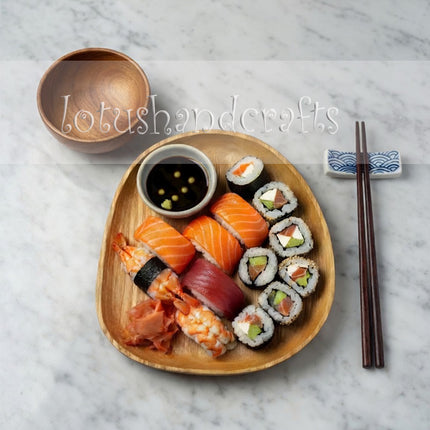 Ashwood pebble shaped serving tray and plate with a cute design that is safe for users.