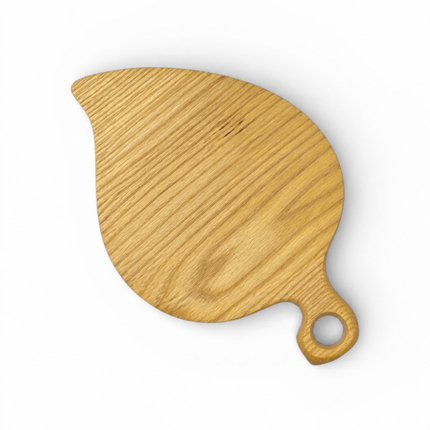 Handcarved ash wood leaf shaped coasters with a smooth finished back surface