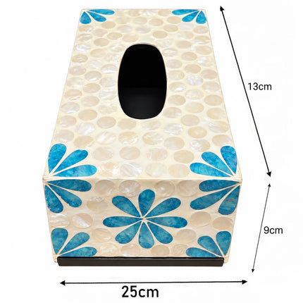 Top-down perspective showing the symmetrical flower details at the corners of the box.