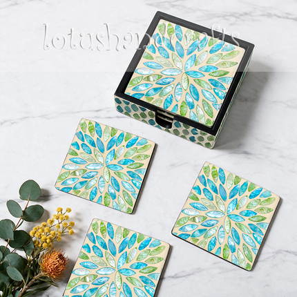 Iridescent mother-of-pearl coaster holder — vibrant blue and green teardrop leaf mosaic pattern.