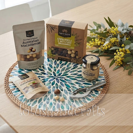 Elegant round placemat showcasing vibrant blue green teardrop shapes arranged in harmonious radiating layers.