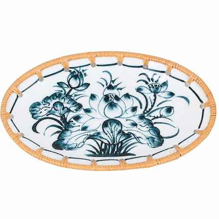 Hand-painted blue lotus flowers and delicate botanical leaves decorate the white ceramic surface.