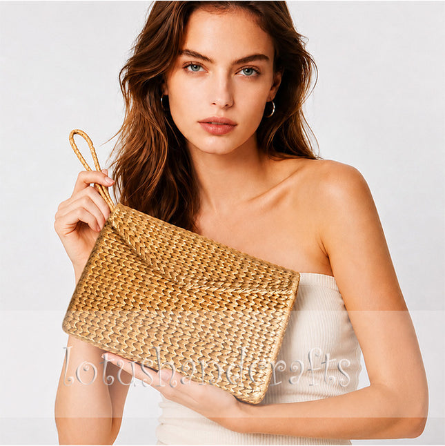 Elegant vintage handmade rattan straw clutch bag.