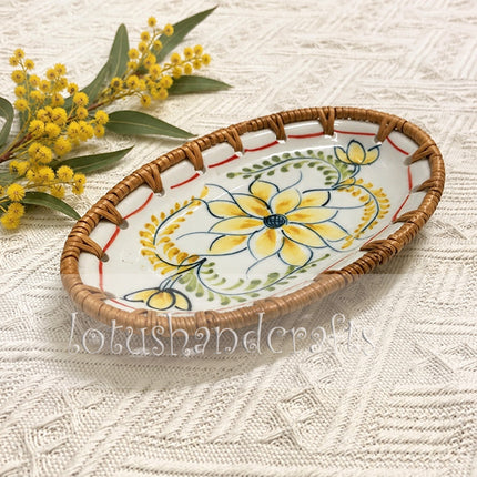 Elegant floral serving tray with a vibrant yellow blossom and symmetrical green and golden foliage, perfect for presenting fruit, snacks, pastries, or desserts.