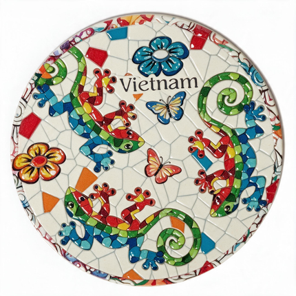 A vibrant round ceramic coaster featuring three colourful salamanders with intricate mosaic patterns on a warm ivory background.
