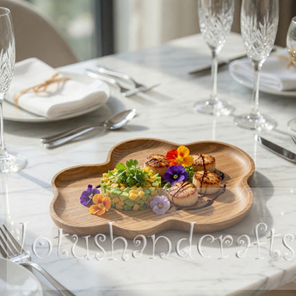 Ash wood cloud shape serving plate with a smooth surface that is easy to clean.