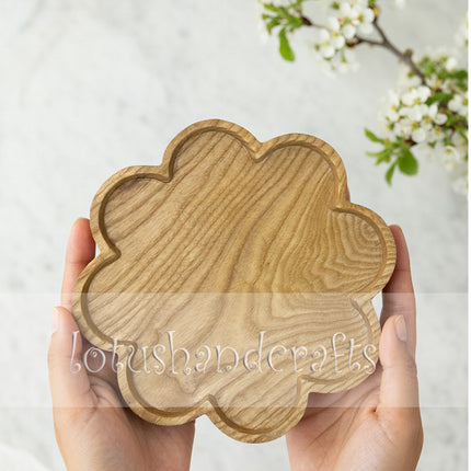 Cosmos flower shaped wooden serving platter for coffee table styling and aesthetic flatlay photography.
