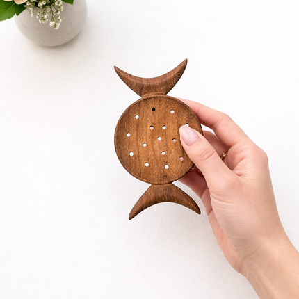 Handcrafted wooden crescent moon magic strainer safe and gentle for everyday use.