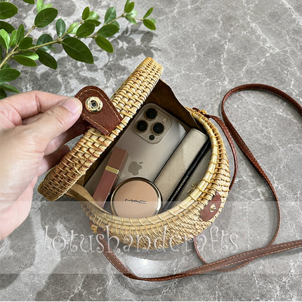 Lovely round rattan crossbody bag with unique mother of pearl inlay.