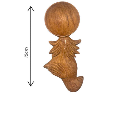 Handcrafted wooden bird spoon offers multiple uses for cooking serving and decorating your kitchen with natural charm.