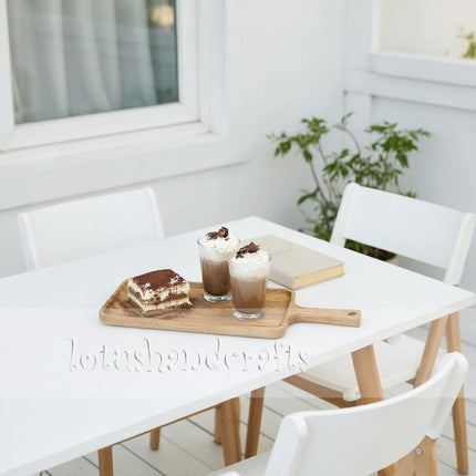Long ash wood serving board with handle offers high durability and lasting everyday performance.