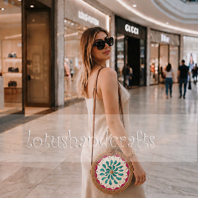 Mother of Pearl Floral Mosaic Round Rattan Crossbody Bag with Delicate Details.