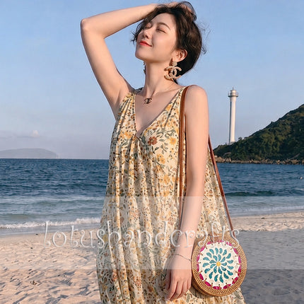 Mother of Pearl Floral Mosaic Round Rattan Crossbody Bag with Unique Design.
