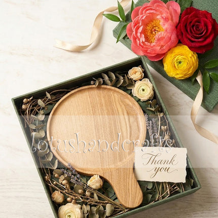 Round AshWood serving tray with handle, a thoughtful gift for coffee and home decor lovers.