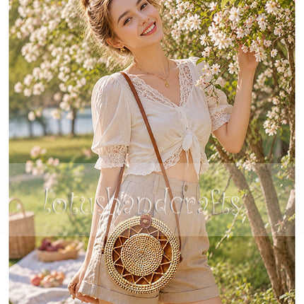 Captivating handwoven round rattan crossbody bag for everyday boho style.