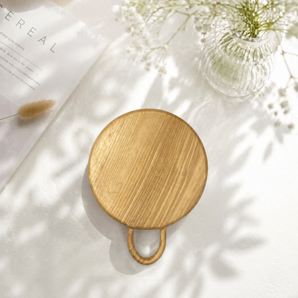 Round wood cutting board with loop handle offers high durability and reliable everyday use.