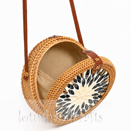 Unique round woven rattan boho crossbody purse with mother of pearl.