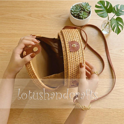 Cute boho rattan shoulder bag for women with a handwoven round design that attracts attention.
