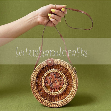Handwoven vintage round rattan crossbody bag with charming natural handicraft style and timeless boho appeal.