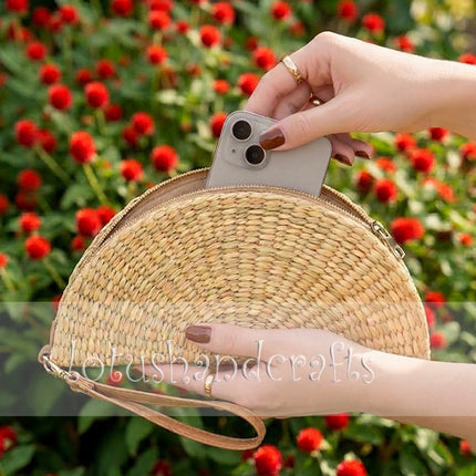 This cute water hyacinth half moon clutch is a beautiful handicraft perfect for everyday use.