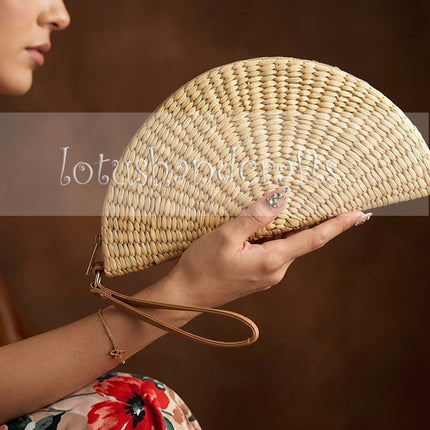 This cute eco friendly half moon water hyacinth clutch is perfect for your summer wardrobe.