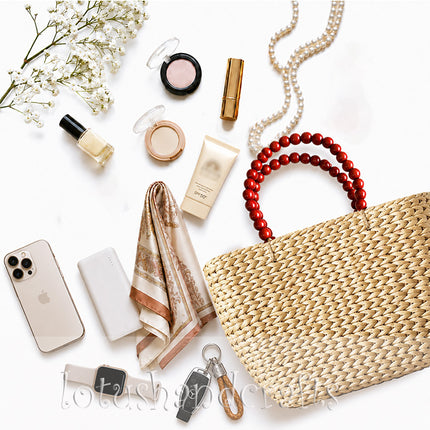 Handwoven water hyacinth tote bag with wooden bead handles for daily use.