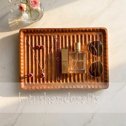 Large wavy redwood serving tray with an elegant design that is easy to clean.