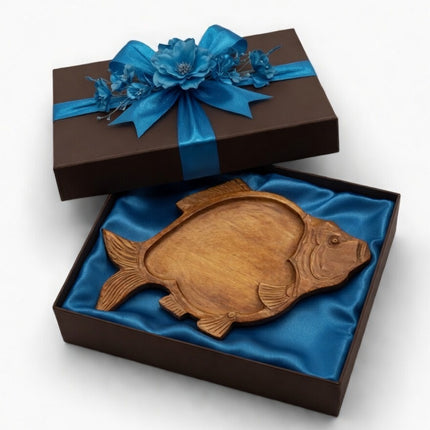 Handcrafted wooden fish shaped serving tray, a meaningful gift for everyday use and decor.