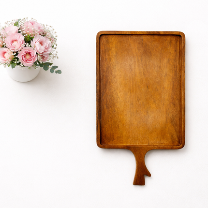Handcrafted wooden serving tray with handle made from natural wood board.