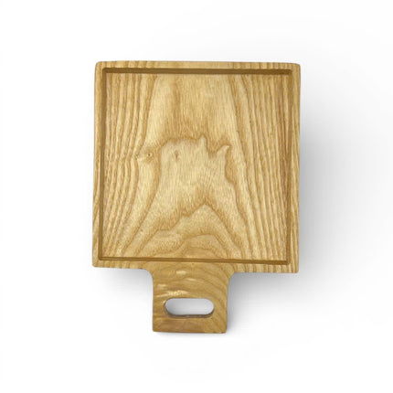 Cute wooden spalted maple square cutting board for serving and everyday kitchen use.