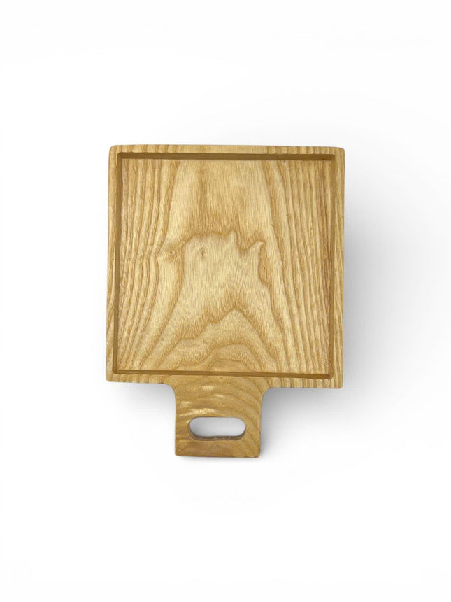 Cute wooden spalted maple square cutting board for serving and everyday kitchen use.