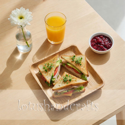 This handcarved ashwood square serving plate is a stylish piece that is easy to clean.