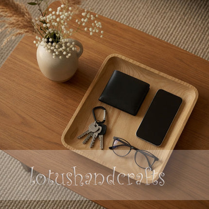 Many people choose the handcarved ashwood square serving plate for its elegant and natural design.