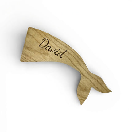 Handcrafted wooden whale tail shape tray with custom name engraving tailored to your needs.
