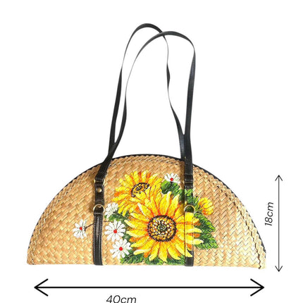 The size of the woven grass half moon bag with sunflowers perfectly fits your needs.