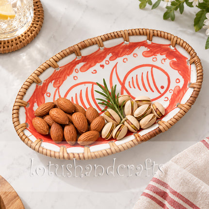 The expressive red fish motif adds playful movement and personality to this handcrafted ceramic piece.