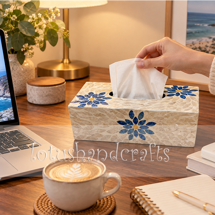 Angle view of the modern light luxury decorative tissue holder displaying vibrant blue flower patterns on a natural shell.